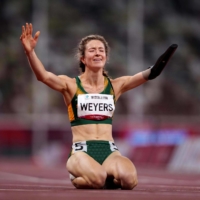 South Africa\'s Anrune Weyers celebrating her victory in the final of the women\'s  T46/47 400 meters | OIS