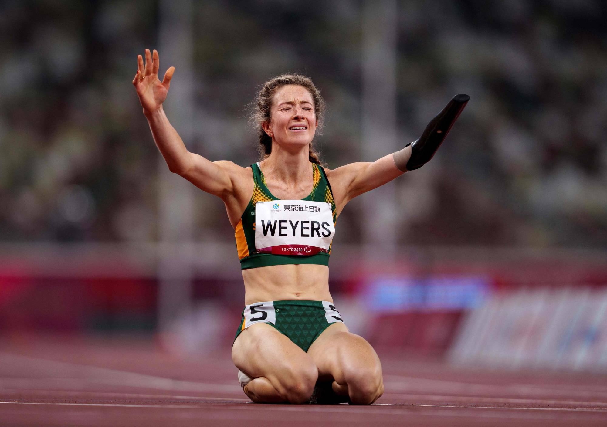South Africa's Anrune Weyers celebrating her victory in the final of the women's T46/47 400 meters | OIS