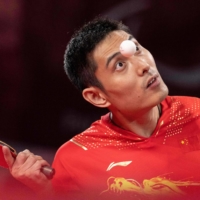 China\'s Feng Panfeng hitting a return against Germany\'s Thomas Schmidberger in the men\'s singles class 3 table tennis gold medal match | OIS