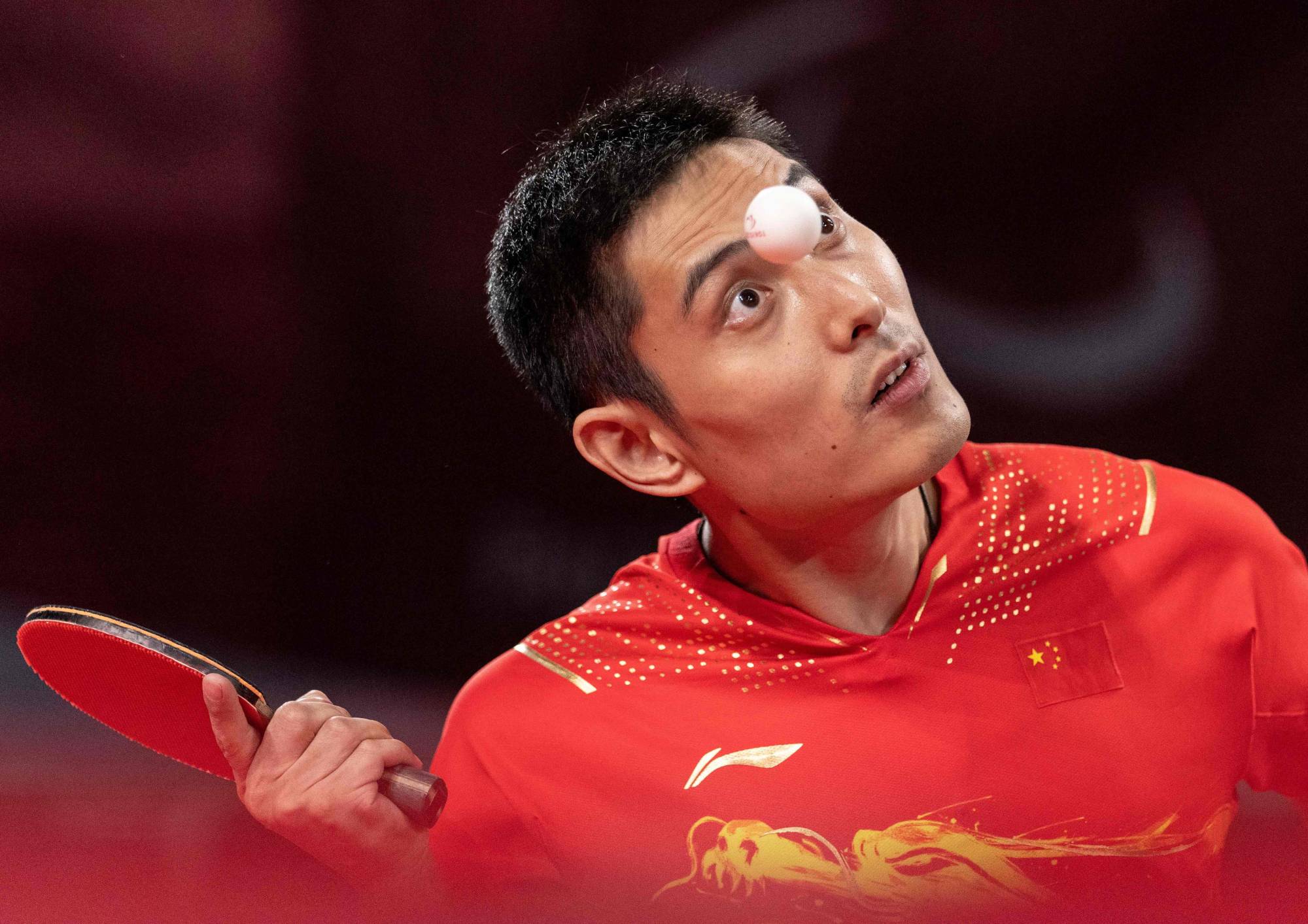China's Feng Panfeng hitting a return against Germany's Thomas Schmidberger in the men's singles class 3 table tennis gold medal match | OIS