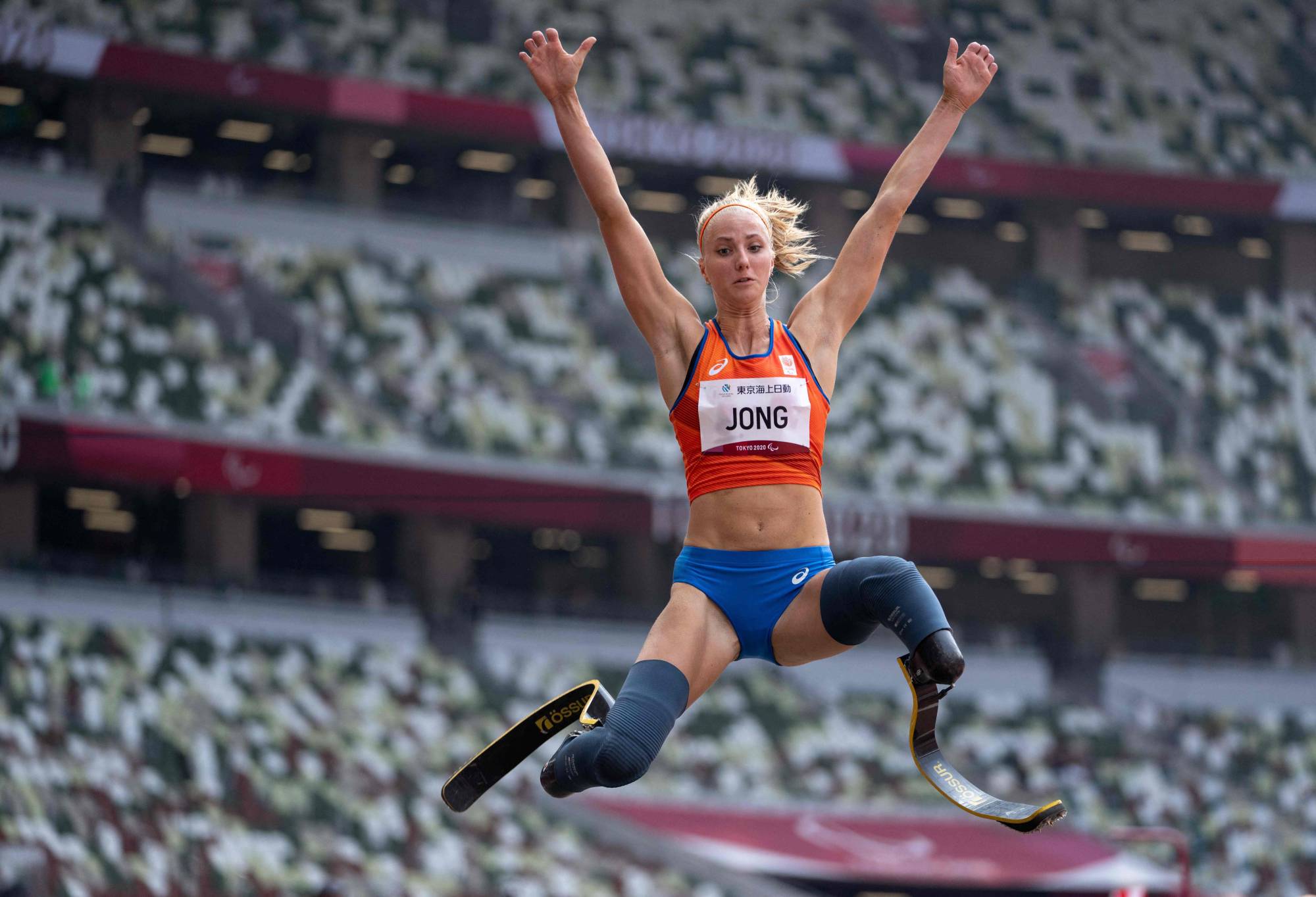 Fleur Jong of the Netherlands competes in the athletics women's T64 long jump | OIS