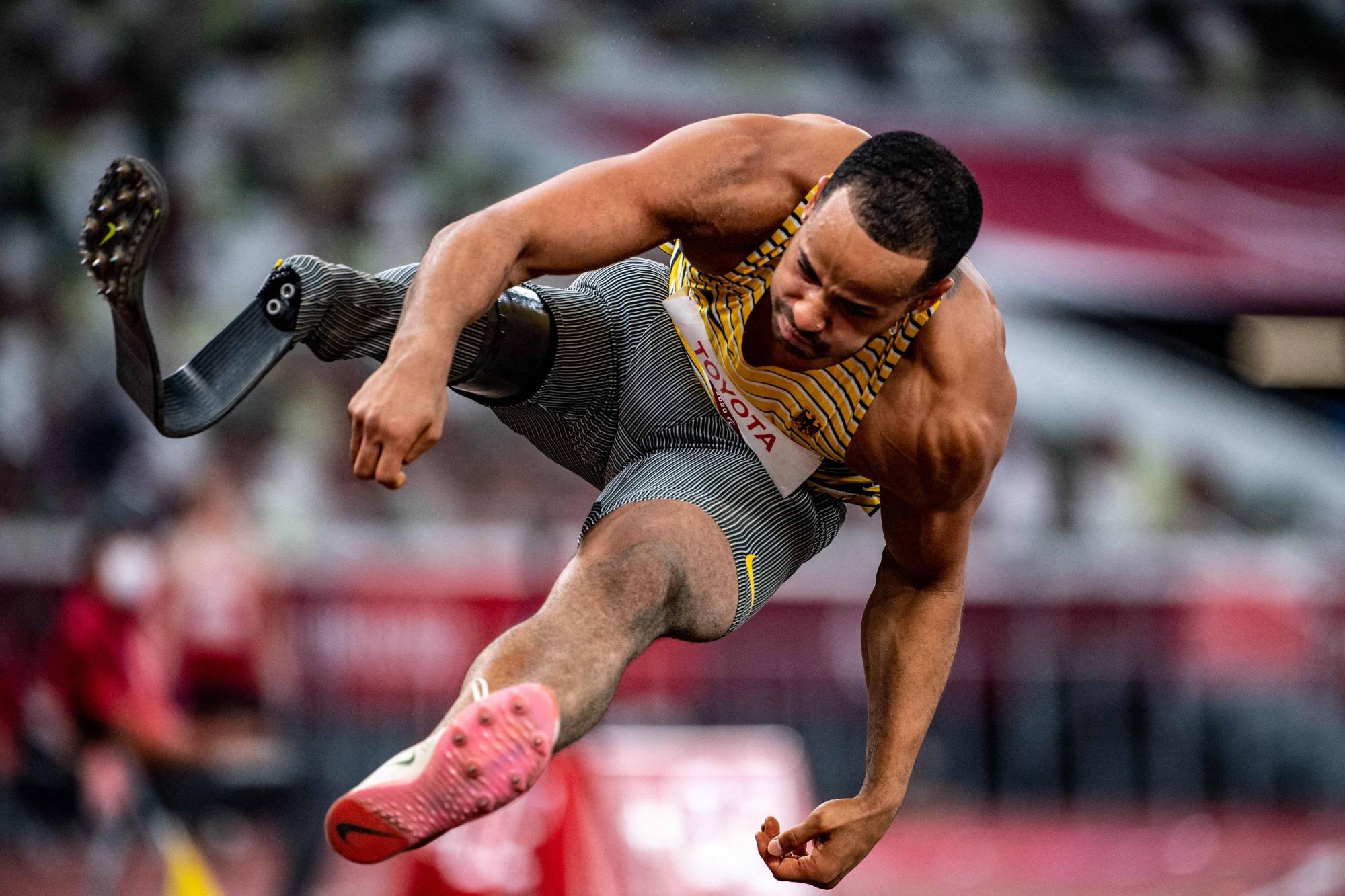 Germany's Leon Schaefer competes in the men's T63 long jump | AFP-JIJI