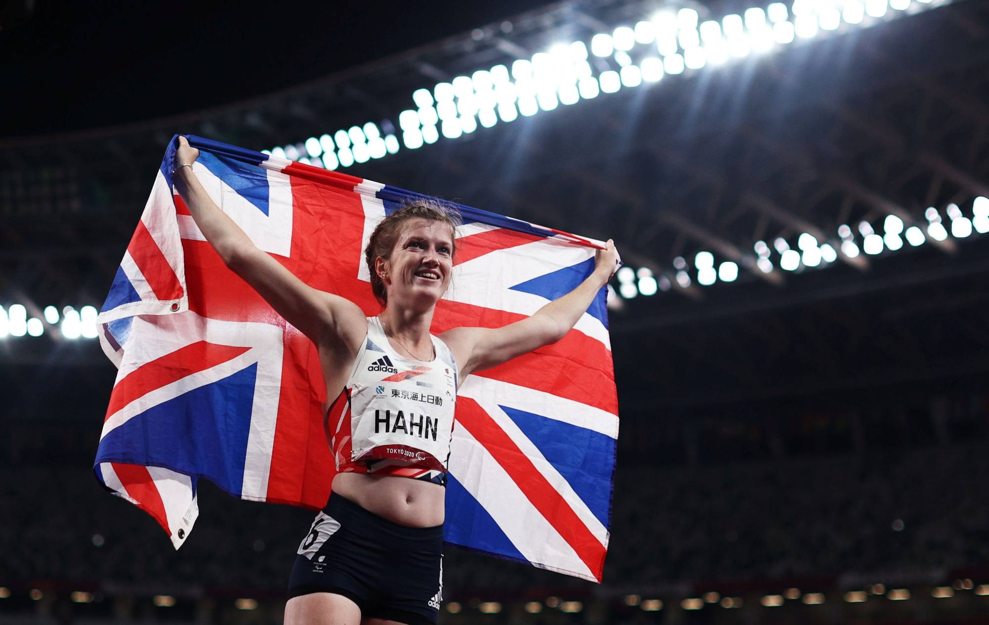 Sophie Hahn of Britain celebrates after winning gold the women's T38 100 meters. | REUTERS