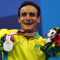 Australia\'s Ahmed Kelly celebrates his silver medal in the men\'s SM3 150-meter individual medley.  | REUTERS