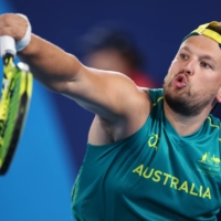 Australia\'s Dylan Alcott of Australia in action during the first round match of quad singles wheelchair tennis against Japan\'s Mitsuteru Moroishi | REUTERS
