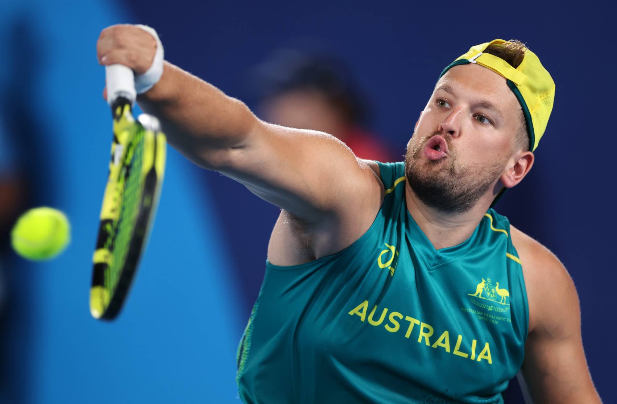 Australia's Dylan Alcott of Australia in action during the first round match of quad singles wheelchair tennis against Japan's Mitsuteru Moroishi | REUTERS