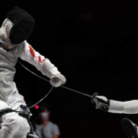 China\'s Gang Sun in action against Hungary\'s Richard Osvath during  the men\'s foil individual event of wheelchair fencing | REUTERS