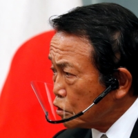 Deputy Prime Minister Taro Aso signaled in July that Tokyo would consider a Chinese invasion of Taiwan an existential threat to its security, allowing Japan to help defend the self-ruled island with the United States. | REUTERS