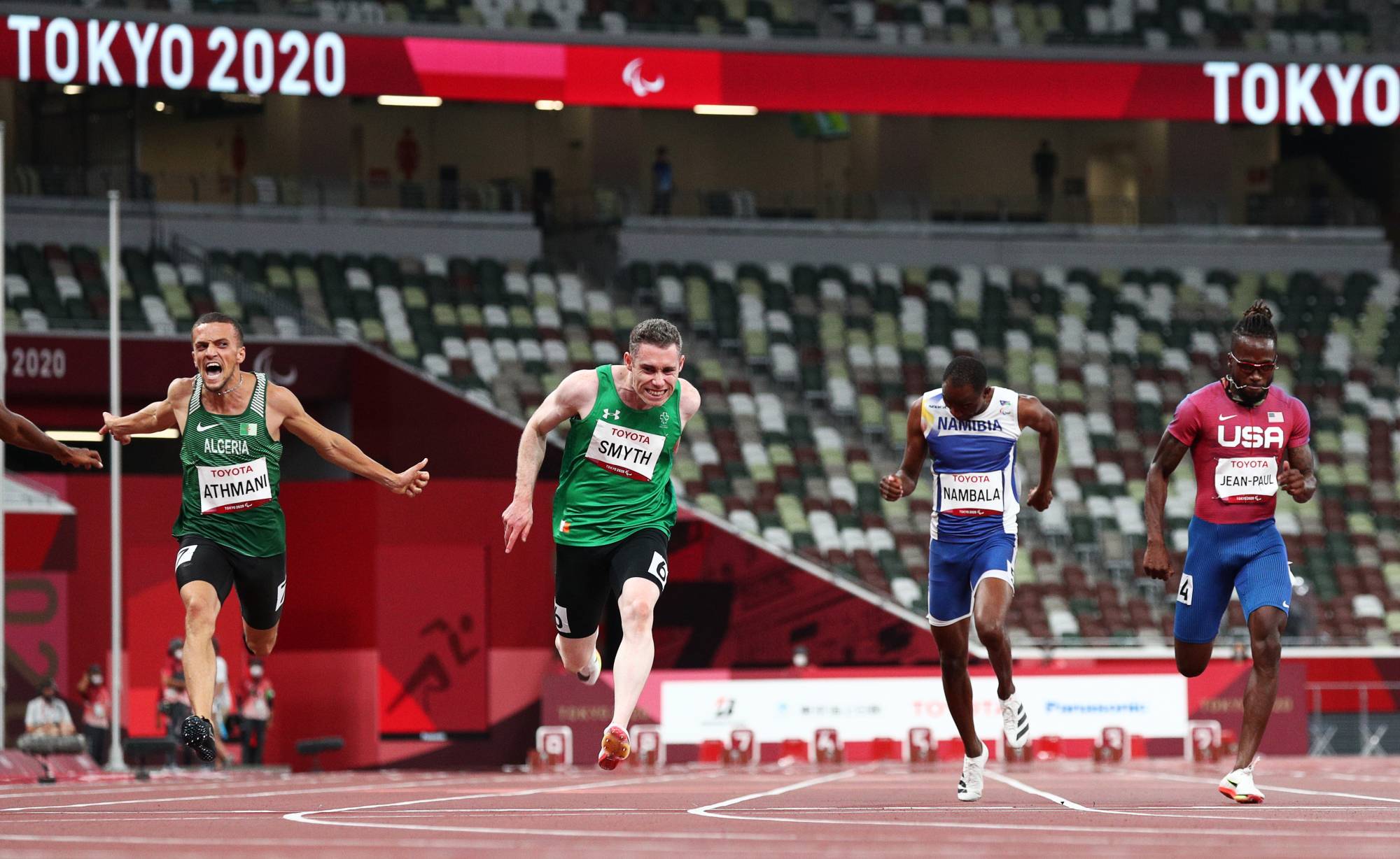Ireland's Jason Smyth crosses the finish line first to win gold in the men's T13 100 meter. | REUTERS