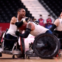 Britain\'s players celebrate their victory in the wheelchair rugby gold medal match against the United States.  | AFP-JIJI