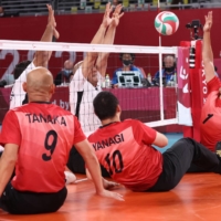 Japan competes against Egypt in a preliminary match of men\'s sitting volleyball. | REUTERS