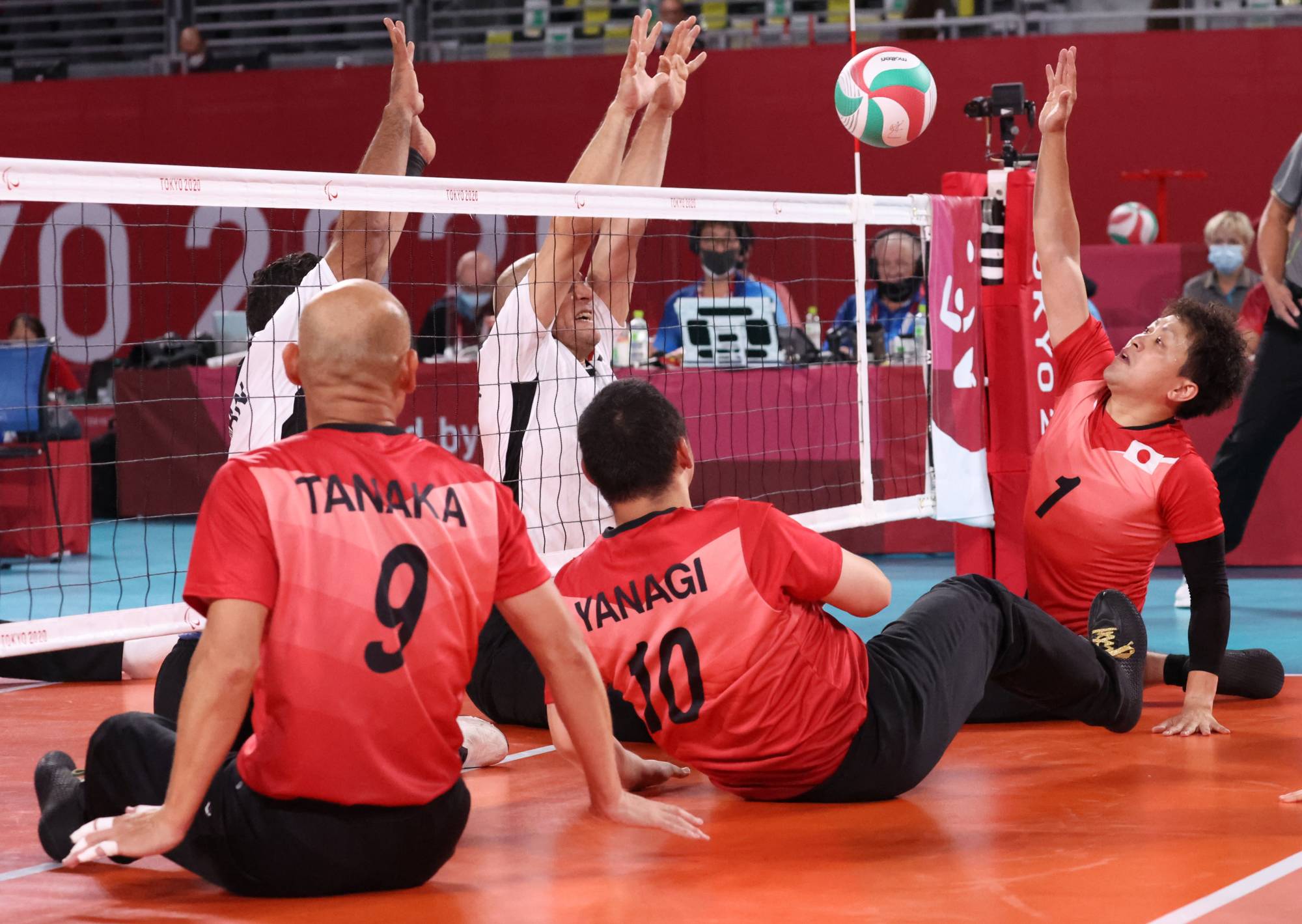 Japan competes against Egypt in a preliminary match of men's sitting volleyball. | REUTERS