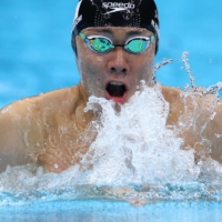 Japan\'s Naohide Yamaguchi on his way to a gold medal in the men\'s SB14 100-meter breaststroke | REUTERS