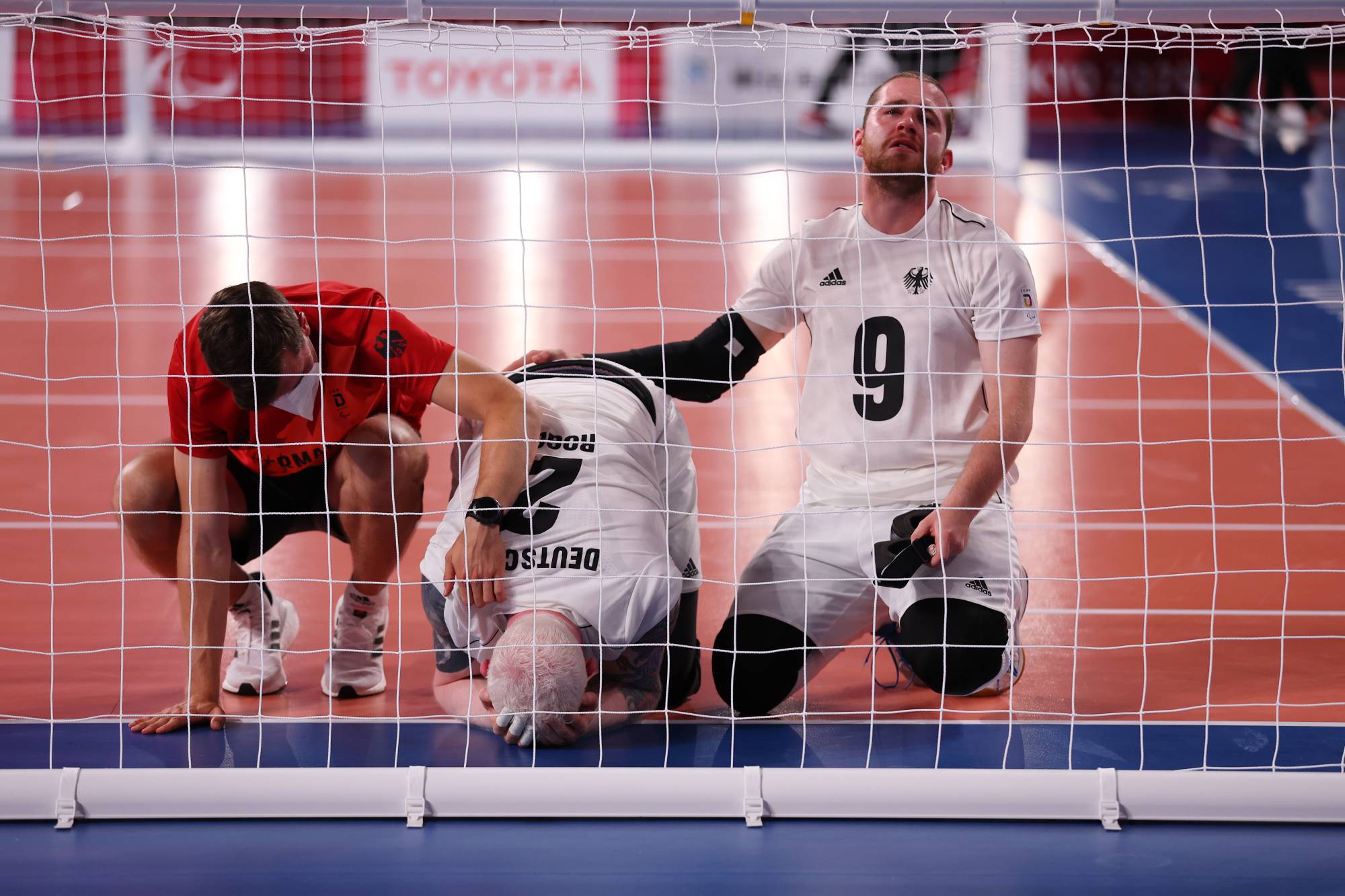 Germany team members react after their defeat to China in the men's goalball group B preliminary. | REUTERS