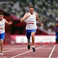 Russian Paralympic Committee\'s Dmitrii Safronov goes for gold in in the T35 100 meters. | REUTERS