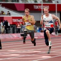 Sherman Isidro Guity Guity of Costa Rica, Johannes Floors of Germany and Jonnie Peacock of Britain compete in the men\'s T64 100-meter final. | REUTERS