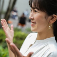 Goto prefers to use sign language while at home with her family, describing long-term use of her cochlear implant as \"tiring.\" | RYUSEI TAKAHASHI