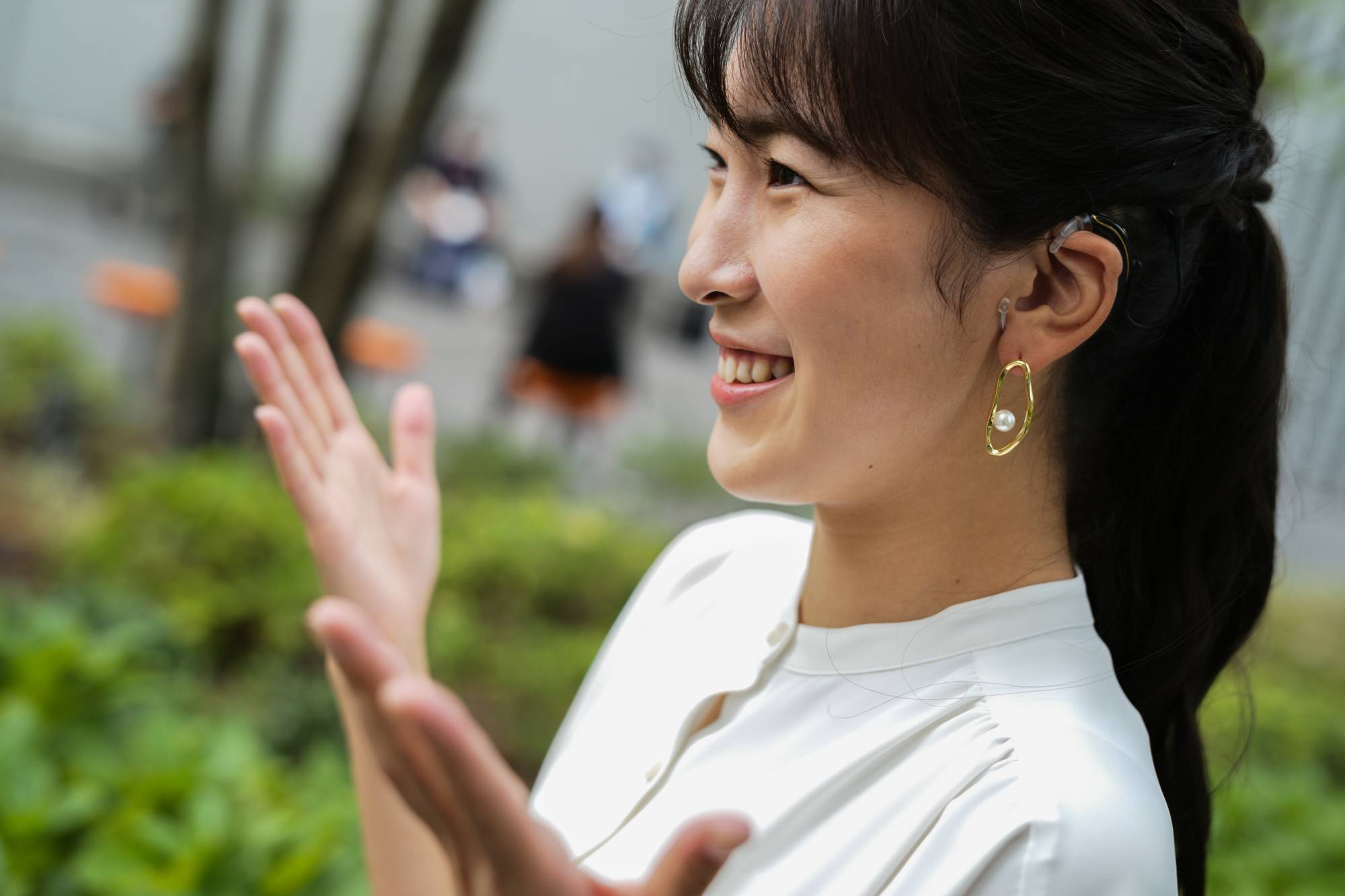 Goto prefers to use sign language while at home with her family, describing long-term use of her cochlear implant as 