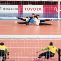 Members of teams USA and Brazil compete in a women\'s preliminary goalball match. | CHANG W. LEE / THE NEW YORK TIMES