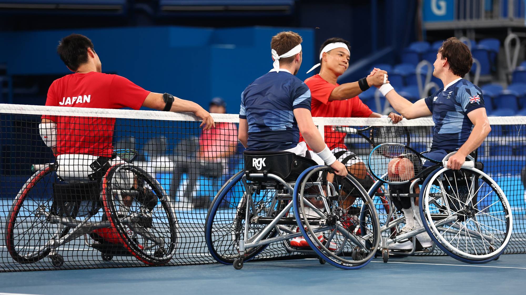 Match winners Alfie Hewett and Gordon Reid of Britain shake hands with Japan's Shingo Kunieda and Takashi Sanada of Japan following the men's doubles semifinal in wheelchair tennis | REUTERS