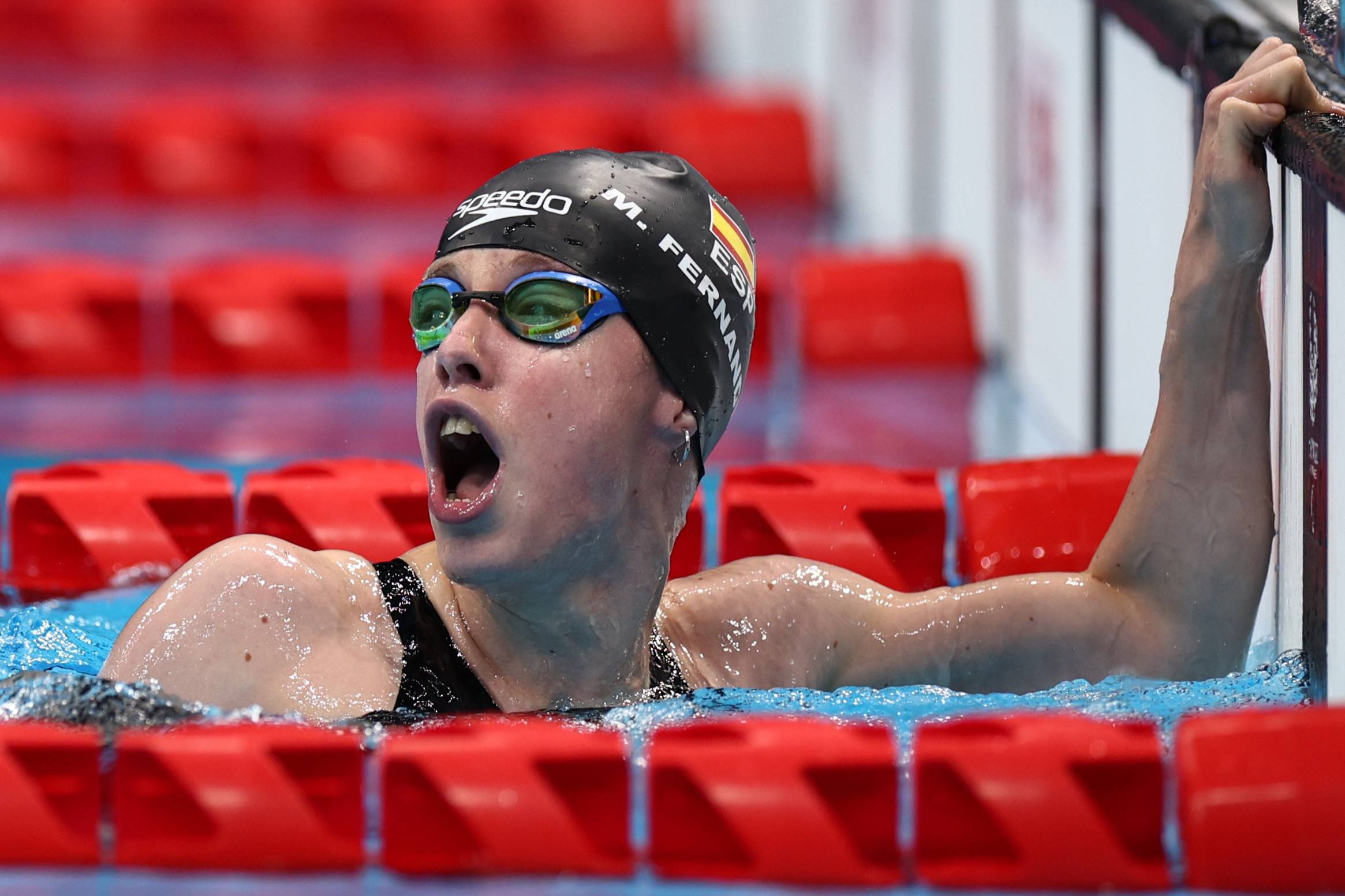 Spain's Marta Fernandez Infante celebrates after winning gold in the women's 50-meter SB3 breaststroke. | REUTERS