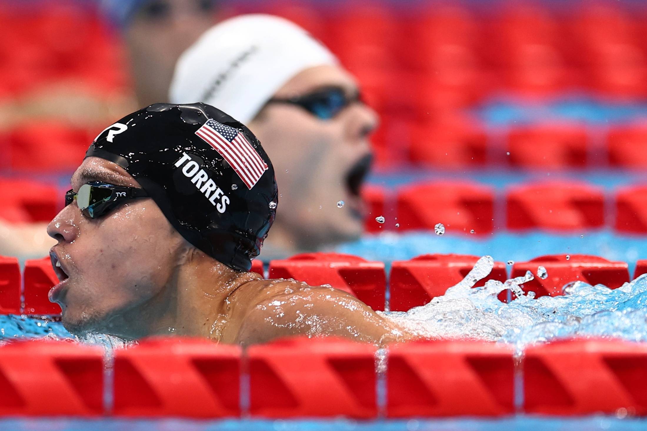 Andrei Nikolaev of the Russian Paralympic Committee and Matthew Torres of the United States in action in the men's S8 400 meter freestyle | REUTERS