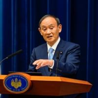 Prime Minister Yoshihide Suga said Wednesday that the Lower House cannot be dissolved amid the current COVID-19 situation, tamping down speculation that he was set to call a general election mid-September. | POOL / VIA REUTERS
