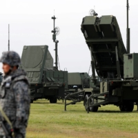 The Self-Defense Force conducts an anti-missile drill using the Patriot Advanced Capability-3 system. If Japan wants to develop strike capabilities, it will have to break the self-imposed 1% GDP cap on defense spending. | REUTERS