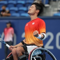 Shingo Kunieda reacts after winning his quarterfinal match over Stephane Houdet of France.  | REUTERS