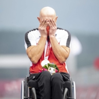 Gold medalist Austria\'s Walter Ablinger reacts on the podium after competing in the men\'s cycling road individual H3 time trial  | AFP-JIJI