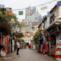 The largely empty Chinatown tourist district in Singapore on Monday | REUTERS 