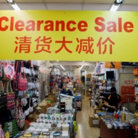 An empty tourist gift shop in Singapore\'s Chinatown on Monday | REUTERS 