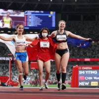 From left: Silver medalist Elena Ivanova of the Russian Paralympic Committee, gold medalist Yiting Shi of China and bronze medalist Danielle Aitchison of New Zealand after competing in the women\'s T36 100 meters | REUTERS