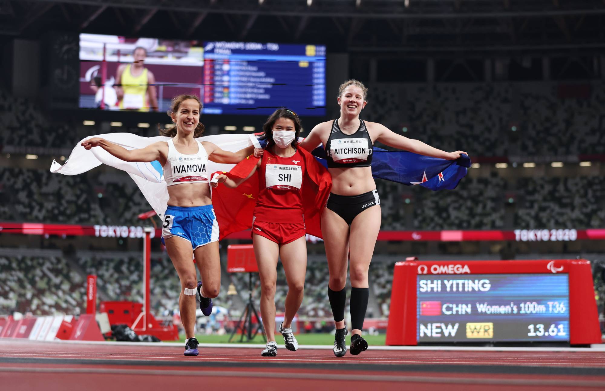 From left: Silver medalist Elena Ivanova of the Russian Paralympic Committee, gold medalist Yiting Shi of China and bronze medalist Danielle Aitchison of New Zealand after competing in the women's T36 100 meters | REUTERS