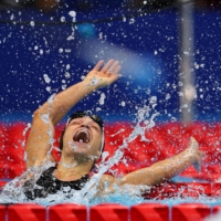 Cyprus\' Karolina Pelendritou celebrates after winning gold and setting a world record in women\'s SB11 100-meter breaststroke. | REUTERS