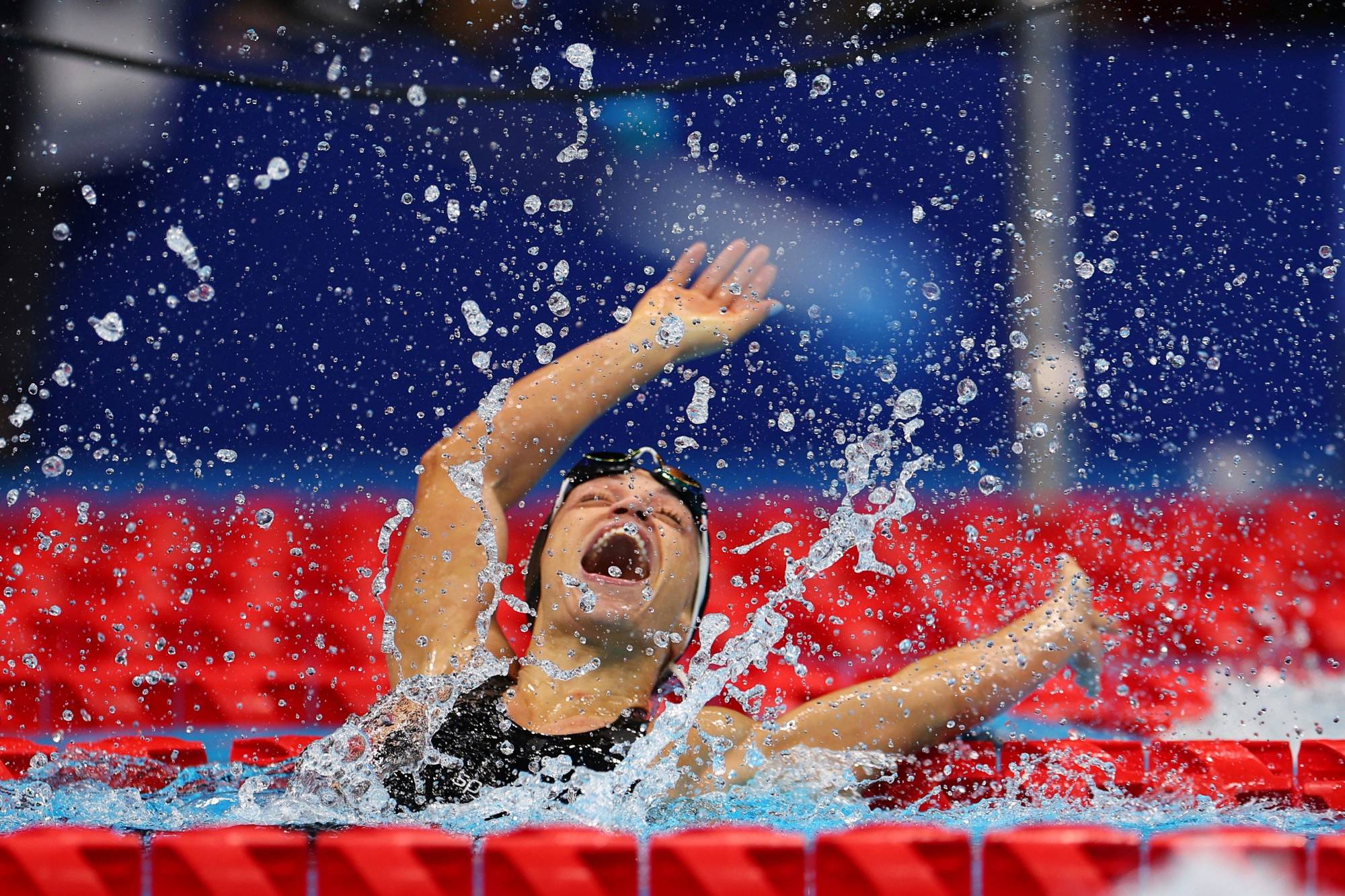 Cyprus' Karolina Pelendritou celebrates after winning gold and setting a world record in women's SB11 100-meter breaststroke. | REUTERS