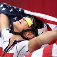 Oksana Masters of the United States celebrates after winning gold in the women\'s H5 cycling road race. | REUTERS