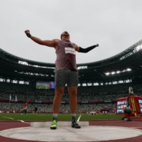 Canada\'s Greg Stewart celebrates winning gold and after setting a new Paralympic record  in men\'s F46 shot put.  | REUTERS