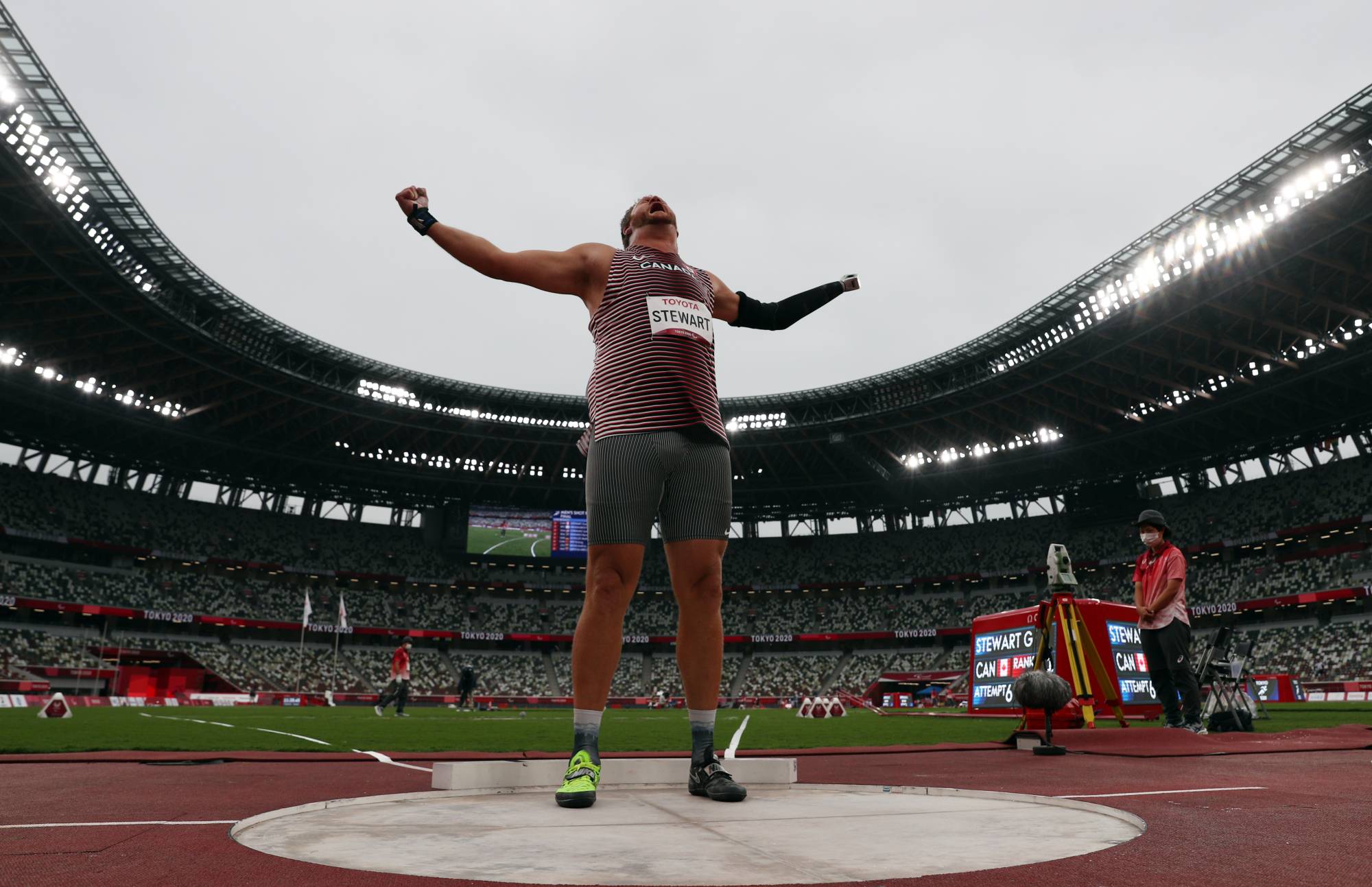 Canada's Greg Stewart celebrates winning gold and after setting a new Paralympic record in men's F46 shot put. | REUTERS