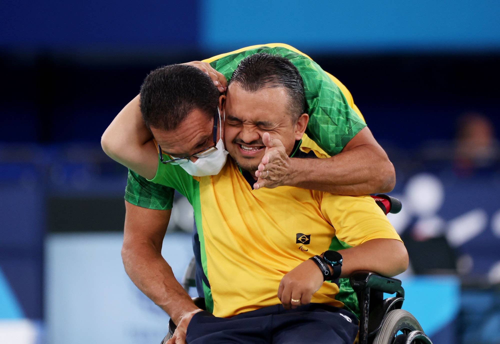 Brazil's Maciel Santos celebrates with his coach after winning bronze in the men's individual competition | REUTERS