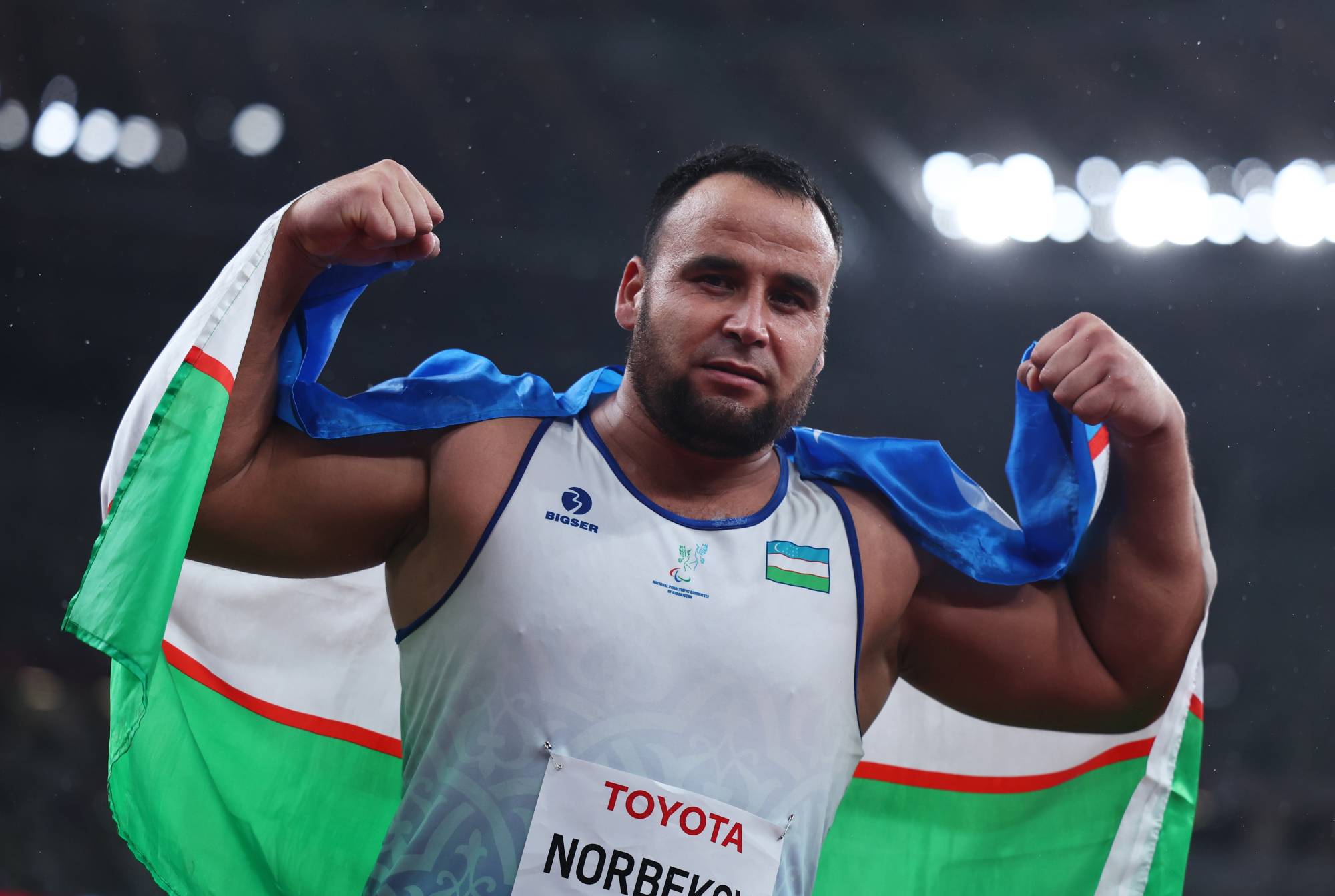 Uzbekistan's Khusniddin Norbekov celebrates after winning gold in the men's F35 shot put. | REUTERS