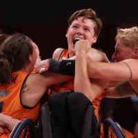 Bo Kramer of the Netherlands celebrates with her teammates their victory over Germany in the semifinal of women\'s wheelchair basketball.  | REUTERS