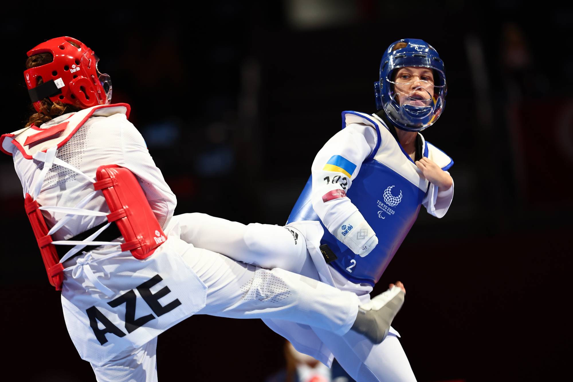 Azerbaijan's Royala Fataliyeva in action against Ukraine's Viktoriia Marchuk during the women's K44 -49kg repechage taekwondo | REUTERS