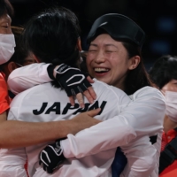 Japan\'s Rie Urata celebrates with teammate Rieko Takahashi after Japan defeated Brazil to earn the bronze medal in women\'s goalball | REUTERS