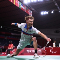 France\'s Meril Loquette in action against Indonesia\'s Suryo Nugroho during men\'s SU5 singles badminton | REUTERS