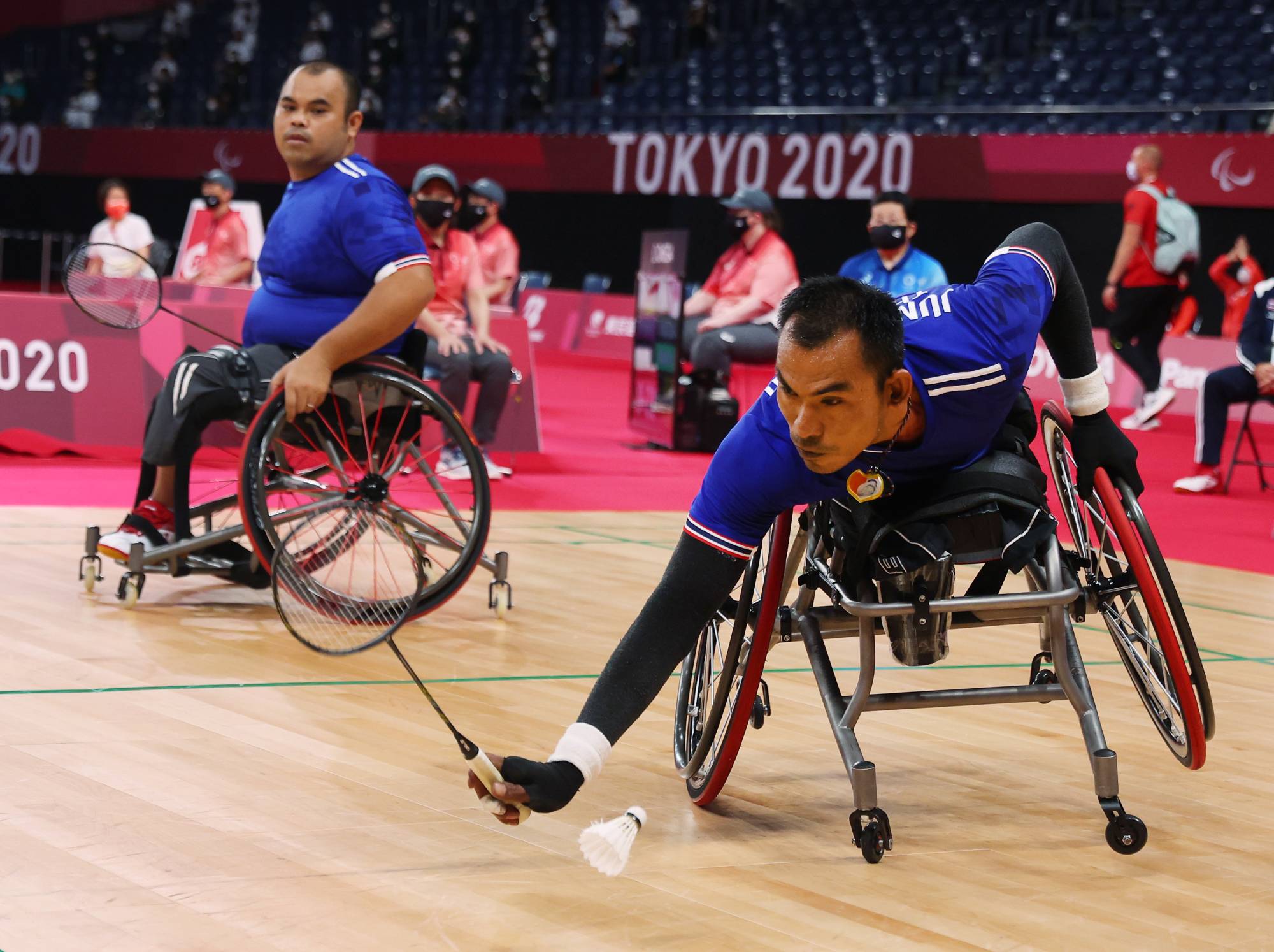 Thailand's Jakarin Homhual and teammate Dumnern Junthong in action during men's doubles badminton. | REUTERS