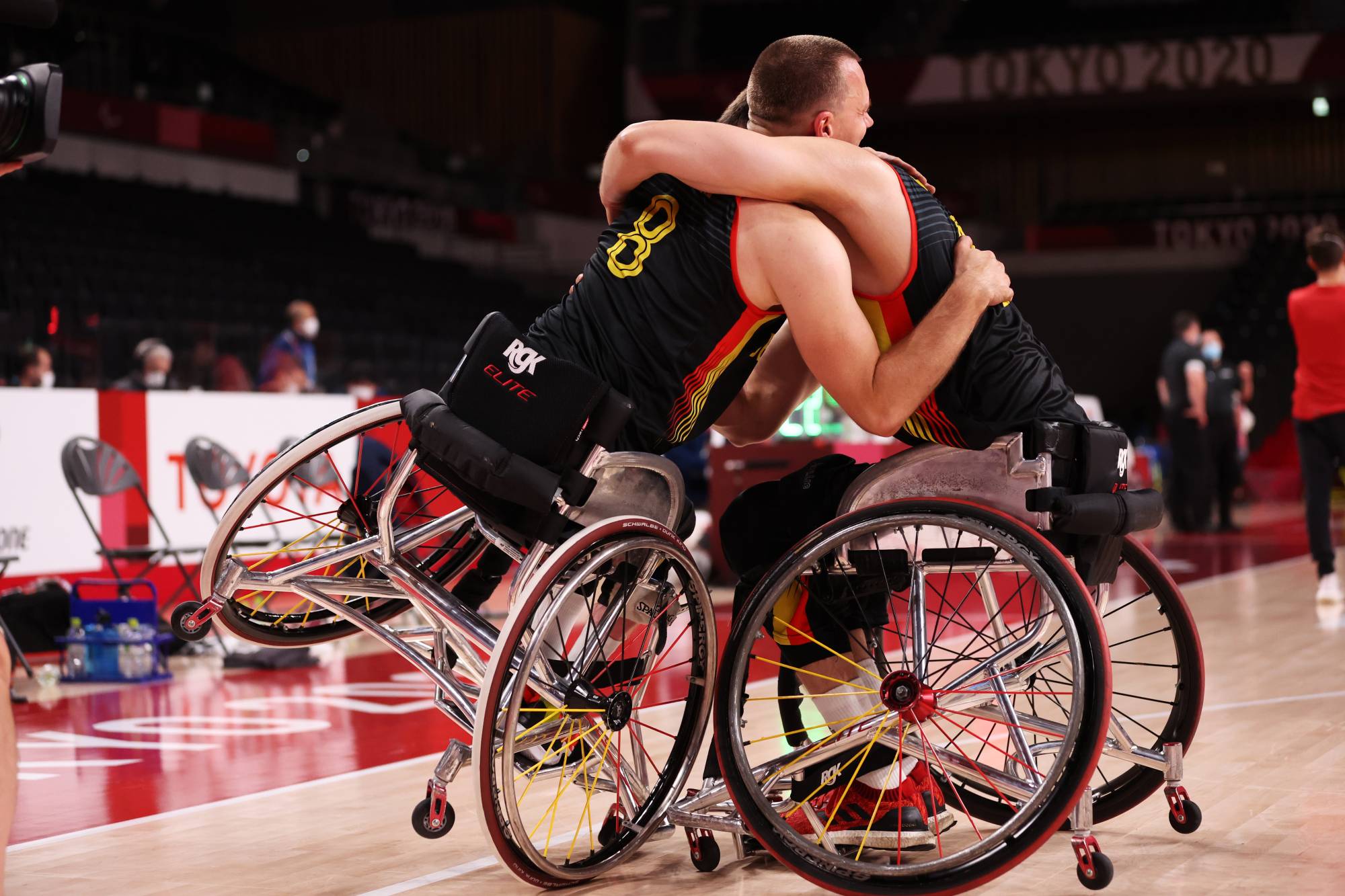 Germany's Aliaksandr Halouski embraces teammate Andre Bienek as they celebrate winning the men's classification 7/8 playoff against Canada. | REUTERS