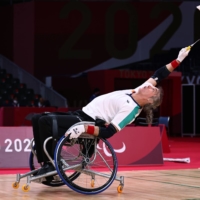 Germany\'s Thomas Wandschneider in action against South Korea\'s Dong Seop Lee during the group A play stage of men\'s SL3 badminton singles. | REUTERS