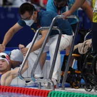 China\'s Yu Liu after setting a world record during a heat of the women\'s S4 50-meter backstroke | REUTERS
