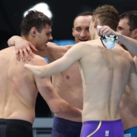 Swimmers from the Russian Paralympic Committee team celebrates after winning the men\'s 4x100m medley relay 34 points final. | REUTERS